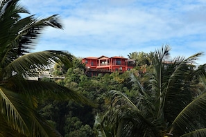 View of villa atop southern ridge of Marigot Bay from across the bay