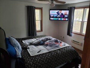 king bed with heating pad and tv
