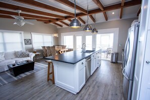 kitchen, dining, and living area, faces beach and decks