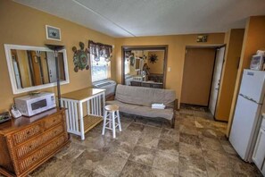 Flooring, Screen, Floor, Furniture, Building