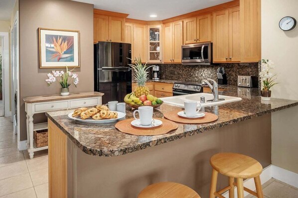 Regency 620 Gorgeous Granite Countertops and Honey Colored Cabinetry