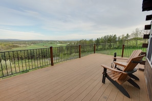 This spacious outdoor deck overlooks 4 different states!