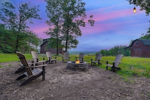 Outside you'll love to enjoy the perfect cool evening by the fire pit! Don't forget the s'more ingredients!