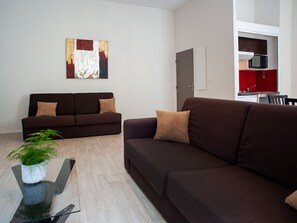 Relax and unwind in the cozy living room.