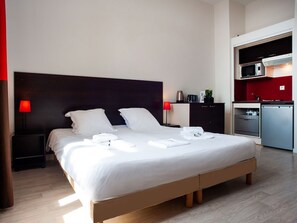 Relax on the comfy bed after a day outside.