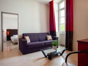 Kick back your feet and relax in the cozy living area.