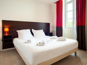 Relax on the comfy bed after a day outside.