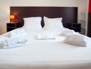 Get a peaceful night sleep in our cozy bedroom.