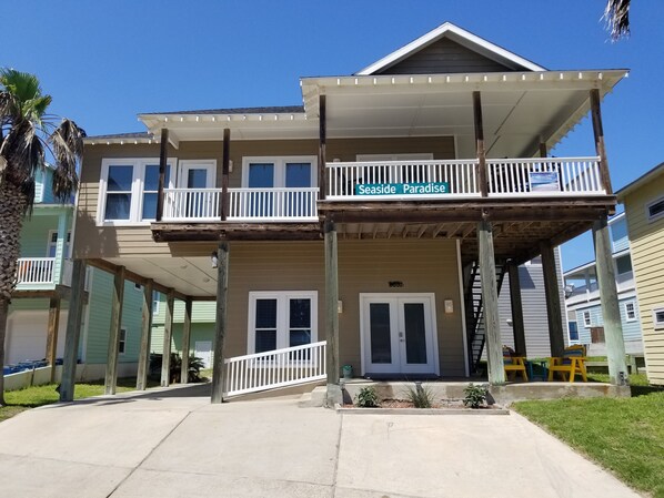 Seaside Paradise in the sought-after neighborhood of Sand Point. 