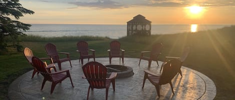 Beautiful stamped concrete fire pit patio over looking Lake Michigan.  