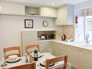 Dining table and well equipped kitchen | Hovera, Glenridding, near Penrith