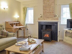 Attractive living room with wood burner | Manor House Cottage, Holme on Swale, near Thirsk