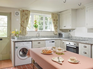Fully appointed kitchen with dining area | Manor House Cottage, Holme on Swale, near Thirsk