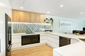 Modern gourmet kitchen with double fridge, double oven and double dishwasher - for easy entertaining.