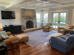 Living Room with ocean views.  French doors open to the deck and barbecue.