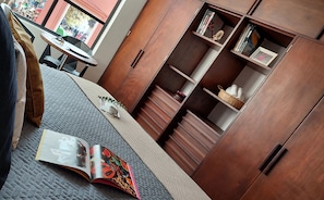 Spacious closet, cozy queen bed, cool design in a serene natural setting