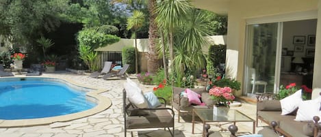 pool and sunny seating