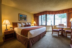 Drift to sleep in the comfortable bedding in our suite.
