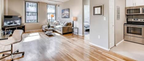 Living Room with downtown and mountain views and lots of natural light