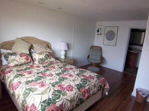 master bedroom, doorway shows 1/2 bath
