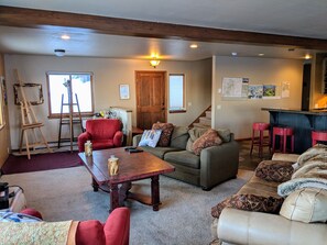 Front door, Art Corner, and stairs to kitchen/living/dining level