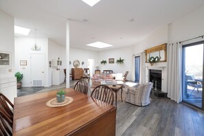 open dining room with dining table that seats up to 10