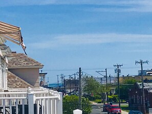 Enjoy a view of the ocean and boardwalk from large southern exposure deck