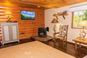 Gas Fireplace makes cabin cozy in any season. 