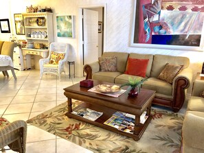 Welcome!! Here’s the view as you walk in: living area leads to dining room.