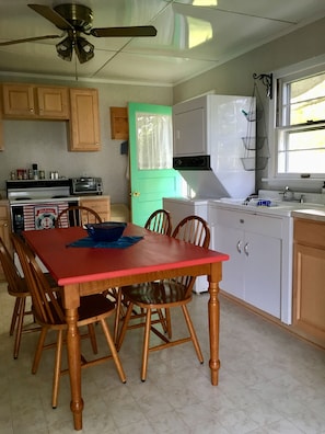 Kitchen is fully equipped for all of your needs.  Notice the combo washer/dryer.