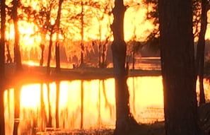 Smaller Sunset Lake serves a a reflecting pond to large Lake Hampton. 