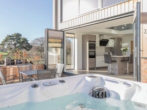 Patio area with hot tub | The Lookout - Broadstone Barns, Ticknall, near Derby