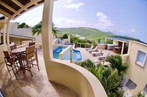 Driveway to the left, Electric gate, outdoor Kitchen to right. Pool 