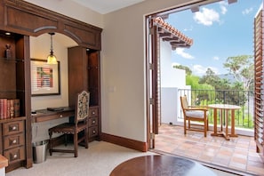 View of desk area and private patio.