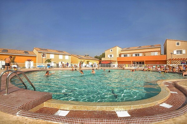 Take in gorgeous views while lounging around the on-site outdoor pool.