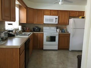 Fully stocked kitchen.