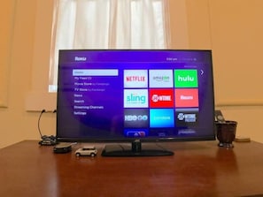 We provide a TV with Roku so you can log into your streaming services.