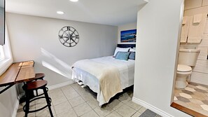 Cozy Bedroom with Queen Bed and TV