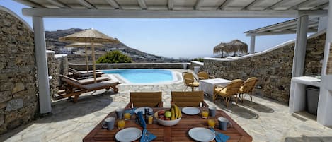 Relax under the wooden pergola