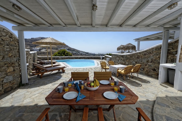 Relax under the wooden pergola