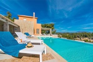 Relaxing by the pool