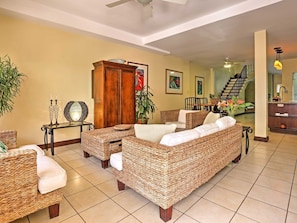 The living area adjoins the dining area and kitchen.