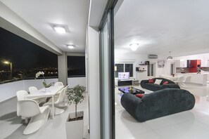 the view at night from the front veranda and the living room!