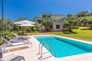 Influenced by the steep hillside on which it sits the villa offers unique layout