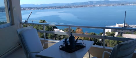view from sitting room balcony over Corinth bay , city of Corinth and  Loutraki 