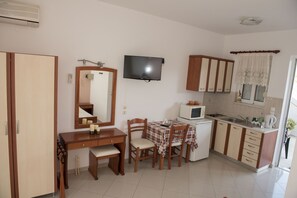 kitchenette fully equipped, table for 2 persons, flat screen tv