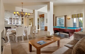 living room with pool view.