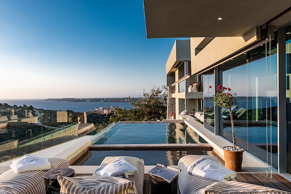 Swimming pool area with sea view 