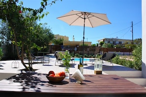 table by the pool