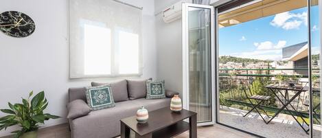 living room and balcony with view